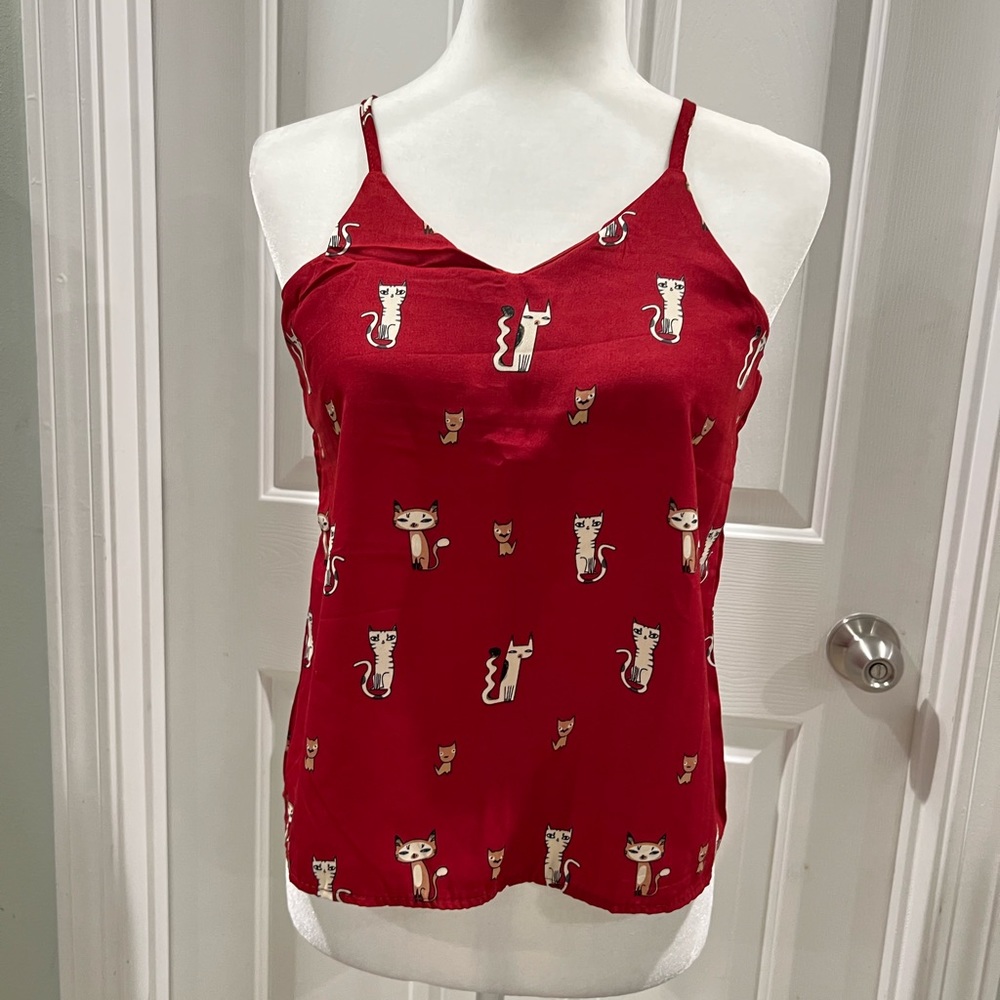 Top-size XS. New without tag.